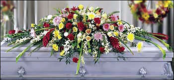 Blanket of Flowers Casket Spray from Clermont Florist & Wine Shop, flower shop in Clermont